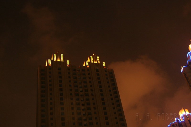 sh37.jpg - They're just apartment buildings, but I though they looked so cool and so Art Deco at night.