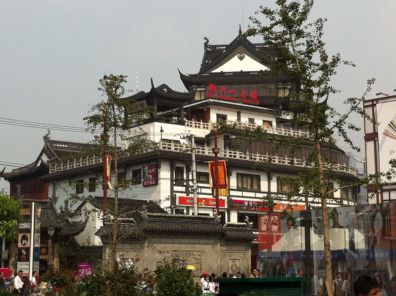 sh7.jpg - This is the old market square in the Yuyuan Market.  Obviously some original architecture survives.