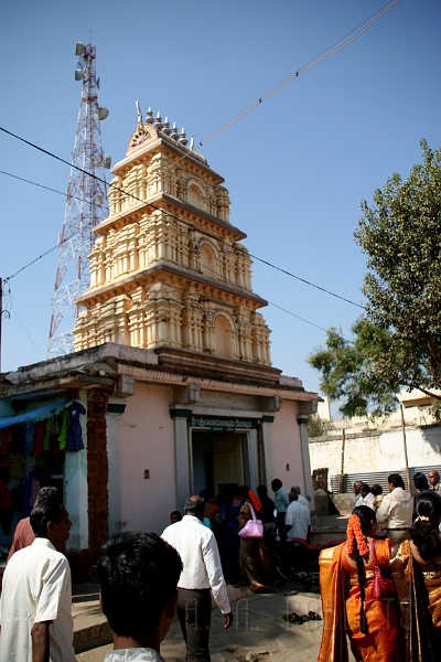 IMG_5267.JPG - I love this image of the old and the new... temple... cellphone tower...  My Indian collegues are never away from their cellphone.  I think they've adopted it much more than anyone in the US.  They are always on it!