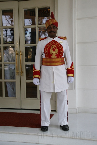 IMG_4802.JPG - This is the doorman.  He's got a great hat too.  He keeps the drivers in line.